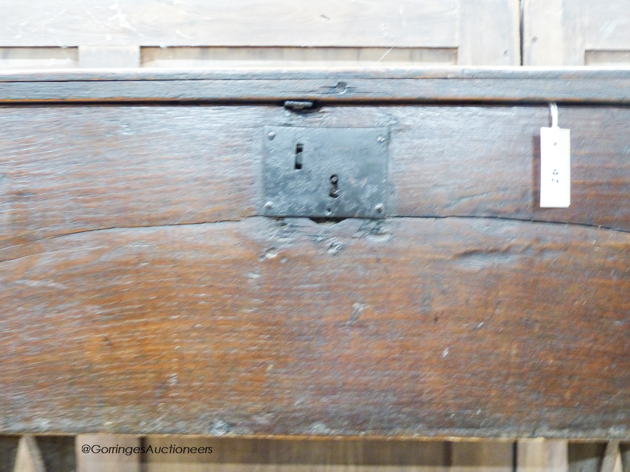 A 17th century oak six-plank coffer of small proportions